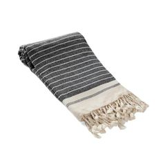 a black and white striped towel with fringes