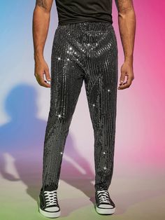 These dress pants feature a unique blend of sequined glitter fabric that adds a fashionable and stylish look to any wardrobe. They are crafted in a slim fit for an enhanced silhouette and come in a variety of colors to match any outfit. They offer a luxurious feel and give any outfit a high-end finish. 94% Polyester, 6% Elastane Imported Pull On closure Hand Wash Only Holiday Party Glitter Bottoms, Party Glitter Bottoms For Party Season, Stretch Sequin Bottoms For Evening, Sequin Stretch Evening Bottoms, Shimmer Bottoms For Party And Holiday Season, Holiday Party Shimmer Bottoms, Party Bottoms With Contrast Sequin And Stretch, Disco Style Sequin Bottoms For Party Season, Embellished Bottoms For Night Out During Party Season