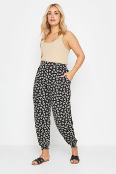 Upgrade your everyday essentials with these new-in harem joggers from Yours Curve. Made from a comfortable jersey fabric, they feature a printed design with an elasticated waistband and cuffed leg. Simply pair with a t-shirt and joggers for an off-duty look that you can wear with confidence. Harem Joggers, Size 20 Women, Leather Jacket Dress, Elegant Wedding Guest Dress, Plus Size Joggers, Size 16 Women, Curve Fashion, Clothing Trends, Plus Swimwear