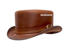 Leather Top Hat Buckle Leather Band Style - Brown Top Hat Handmade with 100% Cowhide Leather Gift for him New with Tags Description: * High-Quality Craftsmanship handmade * Real Leather * 100% pure leather **Those living in remote areas will have to pay $45 extra as shipping charges before the item is shipped. Sizing: Heads come in all sizes, and in a lots variety of shapes. Although high quality hats are adaptable, and will usually conform to differences in shape with a little wearing, it is essential that the size be correct for the head. To determine your hat size, measure the circumference around your head, keeping the tape level and firm, across the temples and above the eyebrow ridges. Check the size chart given below. For in-between measurements use the next size up. Hat Care: Any s Vintage Leather Hat With Flat Bill, Vintage Leather Flat Bill Hat, Vintage Brown Top Hat With Flat Bill, Leather Flat Crown Hat For Western-themed Events, Steampunk Leather Brimmed Hat Bands, Leather High Crown Top Hat For Rodeo, Brown Leather Hat Band With Sweatband, Vintage Leather Hat With High Crown, Vintage Leather Hat Bands For Flat Crown