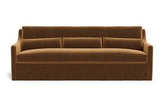 a brown couch sitting on top of a white floor