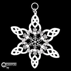 a white snowflake on a black background with the word autumn written below it