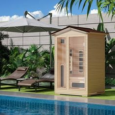 a small wooden sauna next to a swimming pool