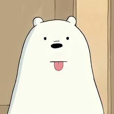 a white polar bear sticking its tongue out in front of a wooden wall and door