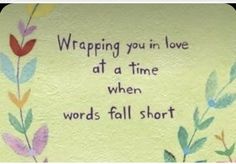 a painting with words written on it that says wrapping you in love at a time when words fall short