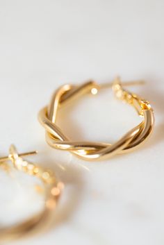 Our Dainty Twisted Hoop Earrings are a perfect, minimalist earrings to add to any outfit! Made with 14K Gold filled metal, and measure 27mm x 28mm. Available in gold. Lead and Nickle free. Layer Jewelry, Twisted Hoop Earrings, Earrings Simple, Layered Jewelry, Jewelry Inspo, Simple Earrings, Ear Jewelry, Minimalist Earrings, Simple Designs