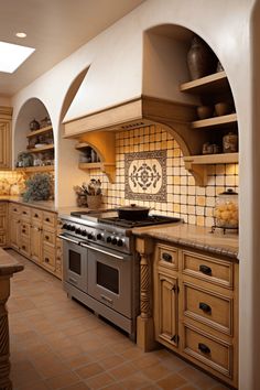 a kitchen with an oven, stove and cabinets