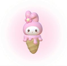 an ice cream cone with a pink hello kitty on it's head and eyes