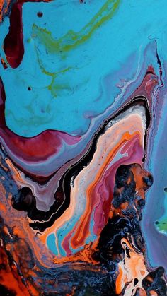 an abstract painting with blue, orange and red colors on it's surface is shown