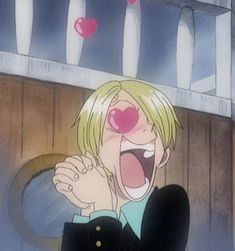 an anime character with his mouth open and tongue out in front of hearts flying above him