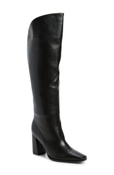 A square toe and angled shaft lend geometric intrigue to a streamlined boot done in faux leather. Side zip closure Synthetic upper, lining and sole Imported Asian & Pacific Islander Owned/Founded Leather High Shaft Mid-calf Boots For Fall, Leather Mid-calf Boots With High Shaft For Fall, High Shaft Faux Leather Boots For Fall, Chic Tall Leather Mid-calf Boots, Formal Boots With Zipper Closure And Block Heel, Formal Block Heel Boots With Zipper, Formal Block Heel Boots With Zipper Closure, Formal Block Heeled Boots With Zipper, Faux Leather Heeled Boots With Sculpted Heel For Work