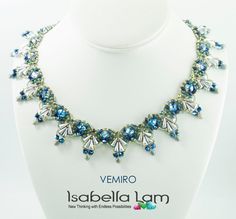 the necklace is adorned with blue and white crystals