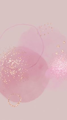 two pink and gold circles with glitter on them