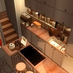 an image of a kitchen setting with counter tops and stools on the floor in front of stairs