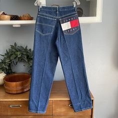 Vintage Y2K Tommy Hilfiger Jeans Big Flag Pocket High Rise Jeans Youth Womens Tag Size: 18 or womens size 26/27 Waist: 27 Rise: 12 Hip: 42" Inseam: 29" 100% cotton Condition: Excellent. 90s Tommy Hilfiger, Tommy Hilfiger Overalls 90s, Tommy Hilfiger Vintage 90s, Tommy Hilfiger Blue Denim Bottoms, Vintage Tommy Hilfiger Sweatshirts, Vintage Tommy Hilfiger Jeans, Tommy Hilfiger Jeans, High Rise Jeans, Tommy Hilfiger