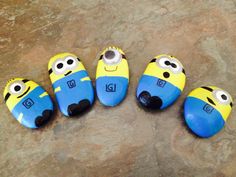 five minion slippers sitting on the ground