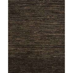 an area rug with dark brown and tan colors on the carpet, it looks like woven fabric