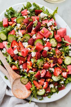 a salad with watermelon, cucumber and feta cheese