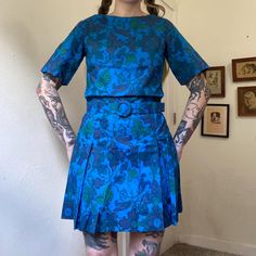 No tags inside. Fits like a size small. Material feels like cotton. Matching belt. Venus metal zipper down back with hook and eye closure at back neckline. No major flaws I noticed besides the material feeling slightly starchy. Seen on a size small, 5'5"1/2, 33 bust, 26 waist & 39" hip.  Shoulders: 14.5" Chest: 17" flat up to 18" (34"-36") Waist: 16.5" (33") belts smaller Hips: 20" (40") Length: 34.5" Vintage Blue Cotton Mini Dress, Vintage Fitted Blue Mini Dress, Vintage Blue Short Sleeve Mini Dress, Blue Vintage Short Sleeve Mini Dress, Blue Belted Mini Dress, Vintage Blue Mini Dress, Blue Floral Mini Dress, Smaller Hips, 60s Vintage