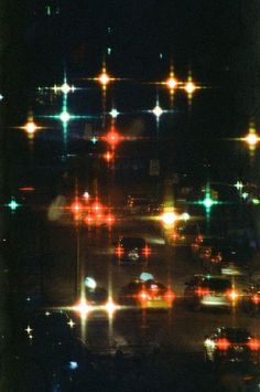 an image of traffic at night in the city