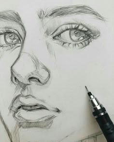 a pencil drawing of a woman's face