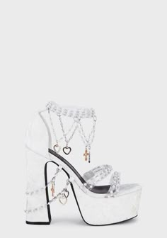 Free, fast shipping on Holy Revelation Platform Heels - White at Dolls Kill, an online boutique for kawaii fashion. Shop our exclusive collection of Sugar Thrillz clothing, shoes, and accessories here. Dollskill Shoes White, White Velvet Heels, Heels With Charms, White Heels For Wedding, Dollskill Heels, Holy Revelation Platform Heels, White Lace Heels, Dollskill Shoes, Angel Shoes