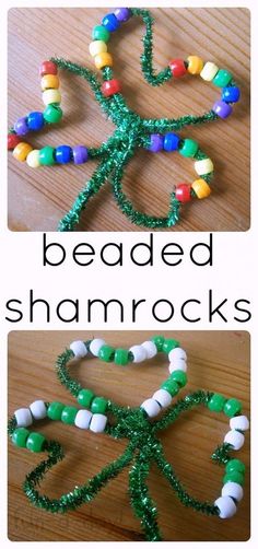 beaded shamrocks made out of beads and green string on a wooden table with text overlay reading beaded shamrocks