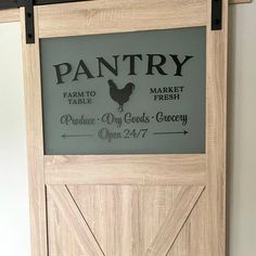 a wooden door with a sign on it that reads pantry and farm fresh market produce