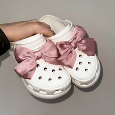 #kawaii #croccharms #crocs #jibbitz #aesthetic #shoecharms #bow #bows #satin #girly Jibbitz Aesthetic, Crocs Jibbitz Aesthetic, Cute White Bow With Ribbon, White Crocs With Pink Charms, White Crocs Aesthetic Charms, Cute White Ribbon Bow, White Crocs With Hello Kitty Charms, Croc Charms Pink, Crocs Charms Sanrio