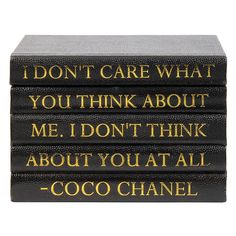 three black books with gold lettering on the front and back, each containing an individual's own quote