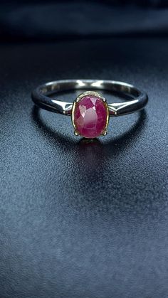 Elevate your jewelry collection with the vibrant allure of this Natural Ruby Ring, expertly crafted in 925 Sterling Silver. Featuring a stunning natural red ruby gemstone, this fashion jewelry piece captures the essence of passion and elegance. With a substantial weight of 2.46g, this gemstone ring is designed for those who appreciate both luxury and comfort, making it a standout addition to any ensemble. Features: Material: Premium 925 Sterling Silver, clearly marked for authenticity, offering Fine Jewelry Red Ruby Ring With Round Stone, Red Ruby Ring With Round Stone Fine Jewelry, Red Ruby Ring With Round Stone, White Gold Round Ruby Gemstones, Fine Jewelry Red Ruby Ring, Red Gemstone Diamond Ring In Sterling Silver, Red Ruby Ring In Sterling Silver, Red Ruby Solitaire Jewelry, Red Ruby Round Band Jewelry