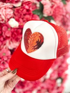 The cutest trucker hat EVER!! This is a red hat with a red sparkly heart on the front of it!! This is perfection for year round wear!! This can be worn around Valentines or just when its a bad hair day!!! Fun Red Trucker Hat, Fun Red Snapback Trucker Hat, Fun Red Adjustable Trucker Hat, Red Adjustable Fun Trucker Hat, Fun Red Snapback Hat With Curved Brim, Red Snapback Hat Gift, Red Snapback Hat As Gift, Fun Red Curved Brim Snapback Hat, Trendy Red Trucker Hat