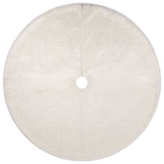 a white round rug with a circular hole in the middle on a white background, it is