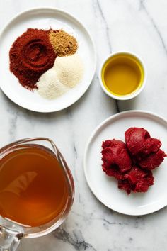 there are three different types of spices on the plates next to each other, including tea