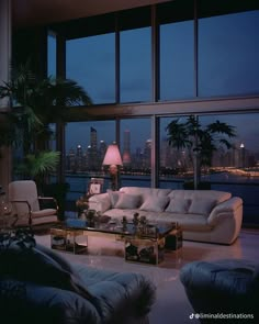 a living room filled with lots of furniture and large windows overlooking the city at night