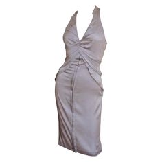 A fabulous lavender stretch silk dress by Tom Ford for Gucci S/S 2003 collection. It has a plunging front neckline and racer back with multiple seams emanating from it and the side seams drawing in the waist. It has a straight skirt with a slit at the back hemline, a matching invisible side zipper and the dress is unlined. Fits Extra Small, Small. Marked Italian size 38. Bust Open Waist 25-27" Hips 36-39" Length 38" Silk Bodycon Dress, Tom Ford For Gucci, Purple Silk Dress, Tom Ford Gucci, Silk Halter Dress, Lavender Silk, Gucci Dress, Girls Couture, Silk Shirt Dress