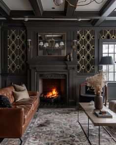 a living room filled with furniture and a fire place in the middle of the room