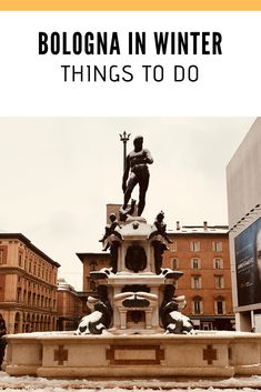 a statue in front of a building with the words bologna in winter things to do