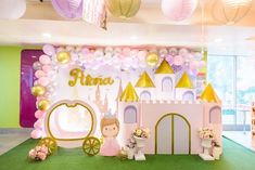 a princess themed birthday party with balloons and decorations