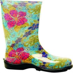 Slip into waterproof comfort with our Midsummer Blue mid-calf 10" rain and garden boot. Lower and wider than most rain boots, there is more room to tuck your pants into and just like the rest of Sloggers boots and shoes, they include "all-day-comfort" insoles and Sloggers signature deep lug sole for great traction in wet and muddy conditions. Easy on and easy to clean up. You'll soon know why Sloggers are America's #1 Backdoor Shoe. Note: prints may vary slightly from boot to boot. Women's sizes Farm Woman, Gardening Boots, Boots Uggs, Rubber Clogs, Winter Gardening, Garden Boots, Classy Clothing, Garden Shoes, Womens Rain Boots