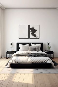 a bedroom with white walls and wood floors, two pictures on the wall above the bed