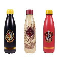 three harry potter water bottles are shown side by side, one is red and the other is black