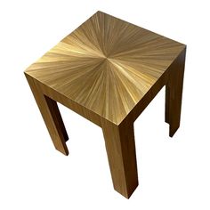 a small wooden table with an intricate design on it's top and bottom edge