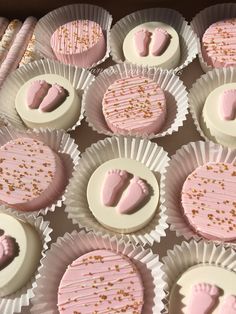 pink and white cupcakes with gold sprinkles