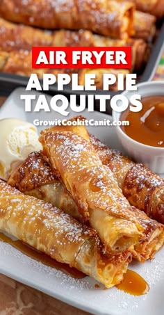 an air fryer apple pie taquitos on a plate with ice cream and sauce