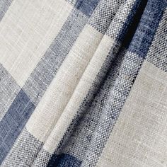 a blue and white checkered fabric is shown