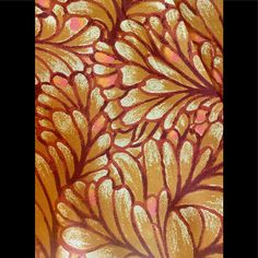 an orange and red flower pattern is shown in this image, it appears to be painted on