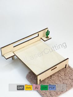 a wooden desk with a cactus on top