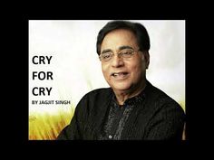 an old man with glasses and black shirt smiling at the camera, in front of a poster that says cry for cry