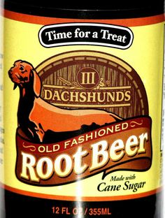 an old fashioned root beer label with a dog on it's back and the caption time for a treat